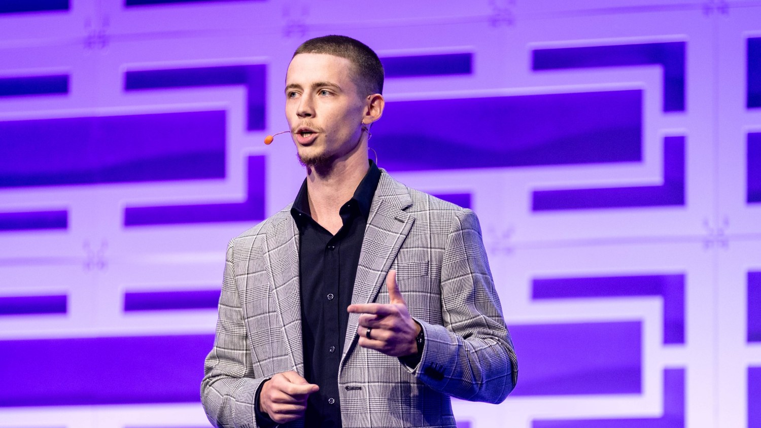 Donevia founder and CEO Eli Christiansen speaking on stage
